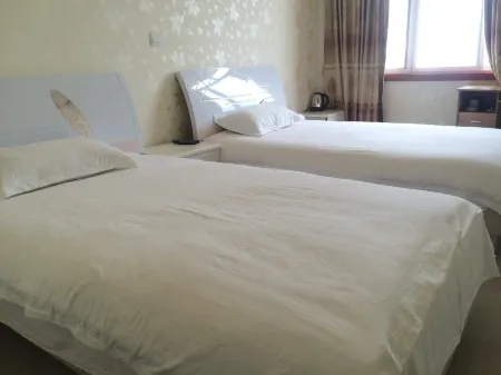 Beichuan Yueyi Xinjie Business Hotel Отели рядом с достопримечательностью «Beichuan Qiangcheng Tourist Area»