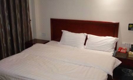 Yugan Xinjiang Hotel - Housity