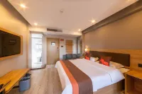 Junyi Chain Hotel (Guangde Shengshi Binhe) Отели в г. Гуанде