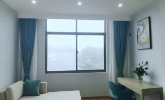 Huoqiu Baozun Hotel
