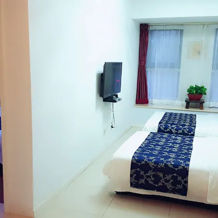 Guan County Hong Pu Traders Hotel