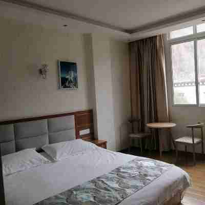 芒康樂途酒店 Rooms