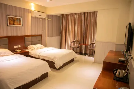 Weihui Yiju Hotel (Bus Station) Отели рядом с достопримечательностью «Bigan Temple»