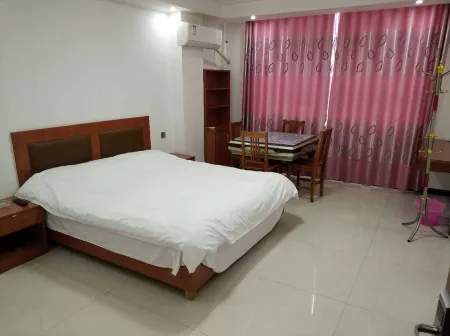 Duchang Baoqing Hotel Отели в г. Доучань