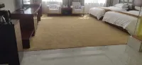 Ejina Grand American Hotel - Airport Shuttle