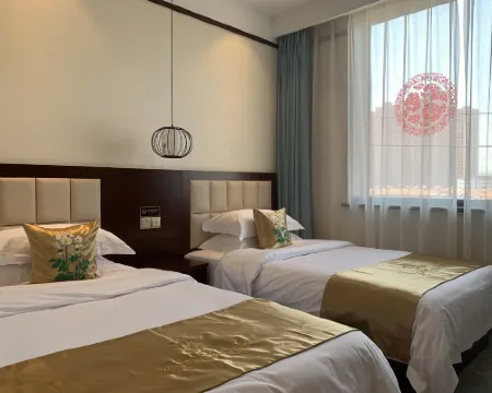 Yuxian Tudou Bann Inn Hotels in Lan County