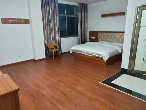 Mengla Jiuzhou Hotel - 2 Sao