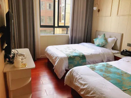 Zhenxiong Xinhao Hotel Отели рядом с достопримечательностью «Chishuiyuan Square»