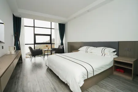 Chicken Mountain Seaside Homestay Отели рядом с достопримечательностью «Baima'ao»