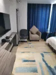 Aitingbao Hotel Puyang - appartements de vacances