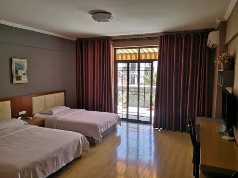 Xuan'en Huaxin Business Hotel