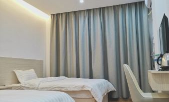 Yudu Zhanqian Business Hotel (Baicheng Railway Station)