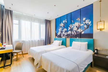 Qingzhu Hotel (Zaozhuang West Station Wanda Plaza) Отели рядом со станцией Zaozhuang West Railway Station