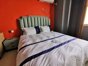 Shiguang Select Apartment (Linyi Linyi Qile Residence Shop)