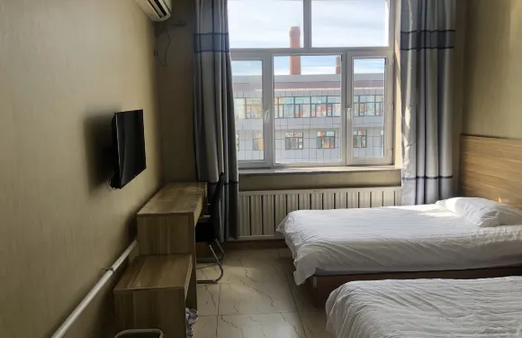 樺川諾客商務賓館