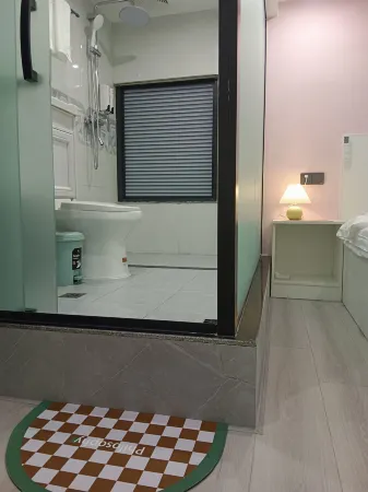 Two plus three guesthouses Отели рядом с достопримечательностью «Chongqing Telecommunication Vocational Institute»