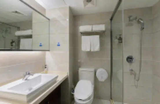 Huzhou Wells Hotel (Zhili Wuyue Plaza China Children's Wear City)