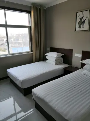 Fuyang Zhoujia Hotel (Guandunxiang Branch)