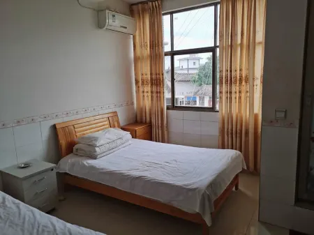 Hefenglongxiang Inn Отели рядом с достопримечательностью «Lufeng Dinosaur Fossil Site»