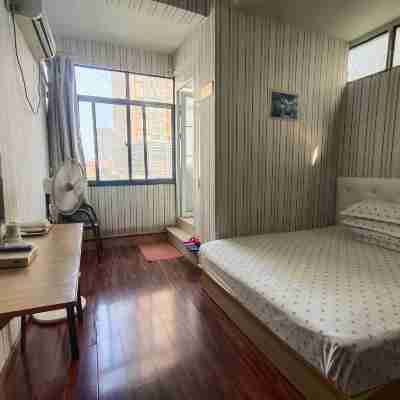 Tianci Business Hostel Rooms