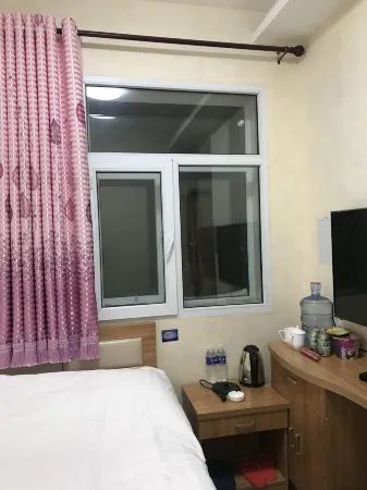 Zhengxiang Baiqi Weiye Business Hotel