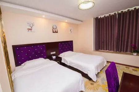Wenchang Guli Business Hotel Отели рядом с достопримечательностью «Sichuan College of Culture and Art (Qiu Campus)»