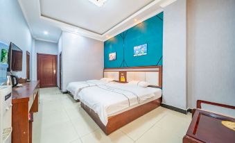 Yuanmou Aiweike Business Hotel