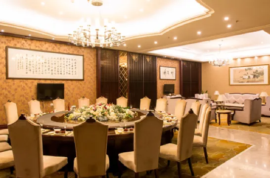 Wansheng International Hotel Отели рядом с достопримечательностью «Nantong Mining Industry Company Workers Culture & Sport Center»