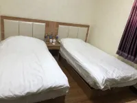 Zhengxiang Baiqi Weiye Business Hotel