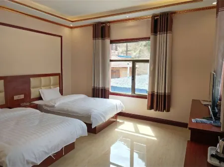 Xiahe Tengzhi Inn Отели рядом с достопримечательностью «White Rock Cliffs»