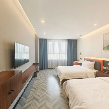 Jianghong Hotel (Korla Railway Station 218 National Road)