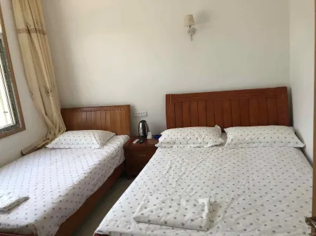 Mulan Prairie Hostel Отели рядом с достопримечательностью «Mulan Grassland»