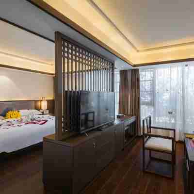 墨江蘭亭園大酒店 Rooms