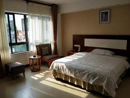 Xiandu Hotel (Ding'an South Building Shop) Отели рядом с достопримечательностью «Nanli Lake»