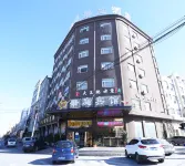 Holiday Huating Hotel (Xinyang Minggang) Hotels near Minggang East  Railway Station