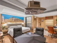 Vienna International Hotel (Zhaotong Wuyue Plaza) Отели рядом с достопримечательностью «Спортивный стадион Юябаошана»