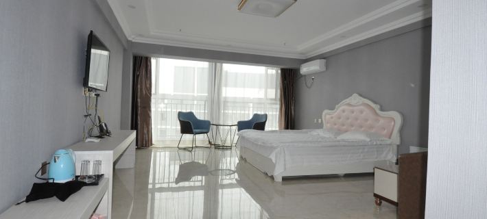 Fuxin Shujing Apartment Hotele w: Fuxin
