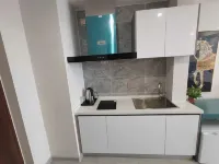 Dandong Xiyue Hotel Apartment (Tianci Future City Shop) - 주방