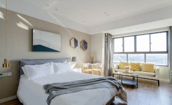 Youshe Shiguang Apartment Hotel