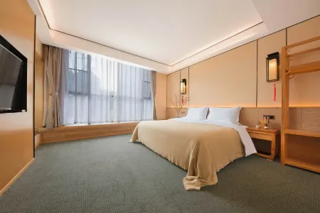 Renshou Huayi Boya Hotel (Wanda Plaza Branch) Отели рядом с достопримечательностью «Sichuan Vocational College of Science and Technology (Renshou Campus)»