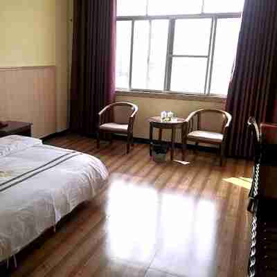 Longsheng Hotel Rooms