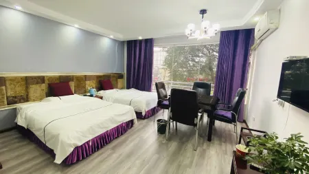 Quxian Xinle Meiju Business Hotel Отели рядом с достопримечательностью «Wenfeng Mountain Cultural Tourism Scenic Area»