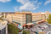Wu Hua Tian Yue Hotel (Zhongwei Gulou South Street Branch) Các khách sạn gần Xingulou Building
