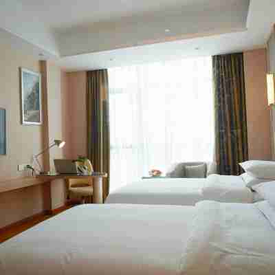 維也納國際酒店（瀘州高鐵站西南商貿城店） Rooms