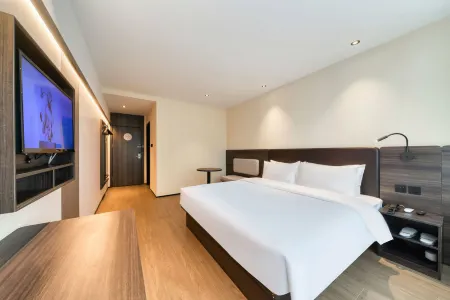 Junyi Hotel (Shangrao Jiangnan Commercial City High-speed Railway Station) Отели рядом с достопримечательностью «Shangrao Botanical Garden»