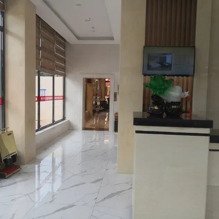 Lingshan Xinde Business Hotel (Xinwei Town Branch)