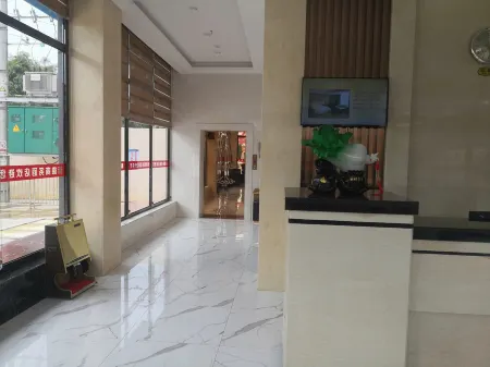 Lingshan Xinde Business Hotel (Xinwei Town Branch)