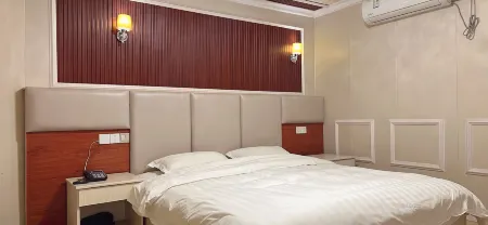 Shunda Business Inn Отели рядом с достопримечательностью «Taiji Wuse Valley»