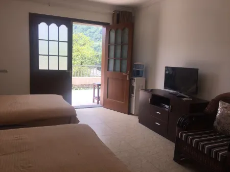 Wenchuan Xinyuan Inn Отели рядом с достопримечательностью «Baihua Bridge Relic Site»