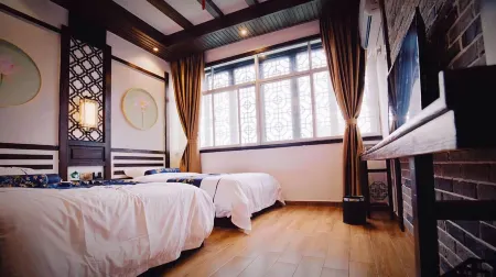 Luxi Pushi Zui Chinese Inn Отели рядом с достопримечательностью «Yao Family Courtyard in Taiyuan, Shanxi»